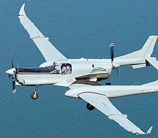 You don't see that very often! An airborne DEA surveillance plane (Photo by Schweizer Aircraft/MCT).